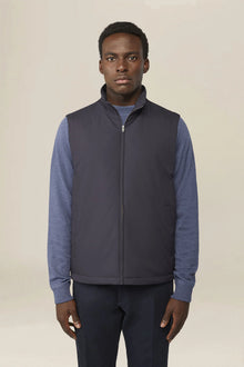 Slightly padded reversible technical fabric sleeveless jacket