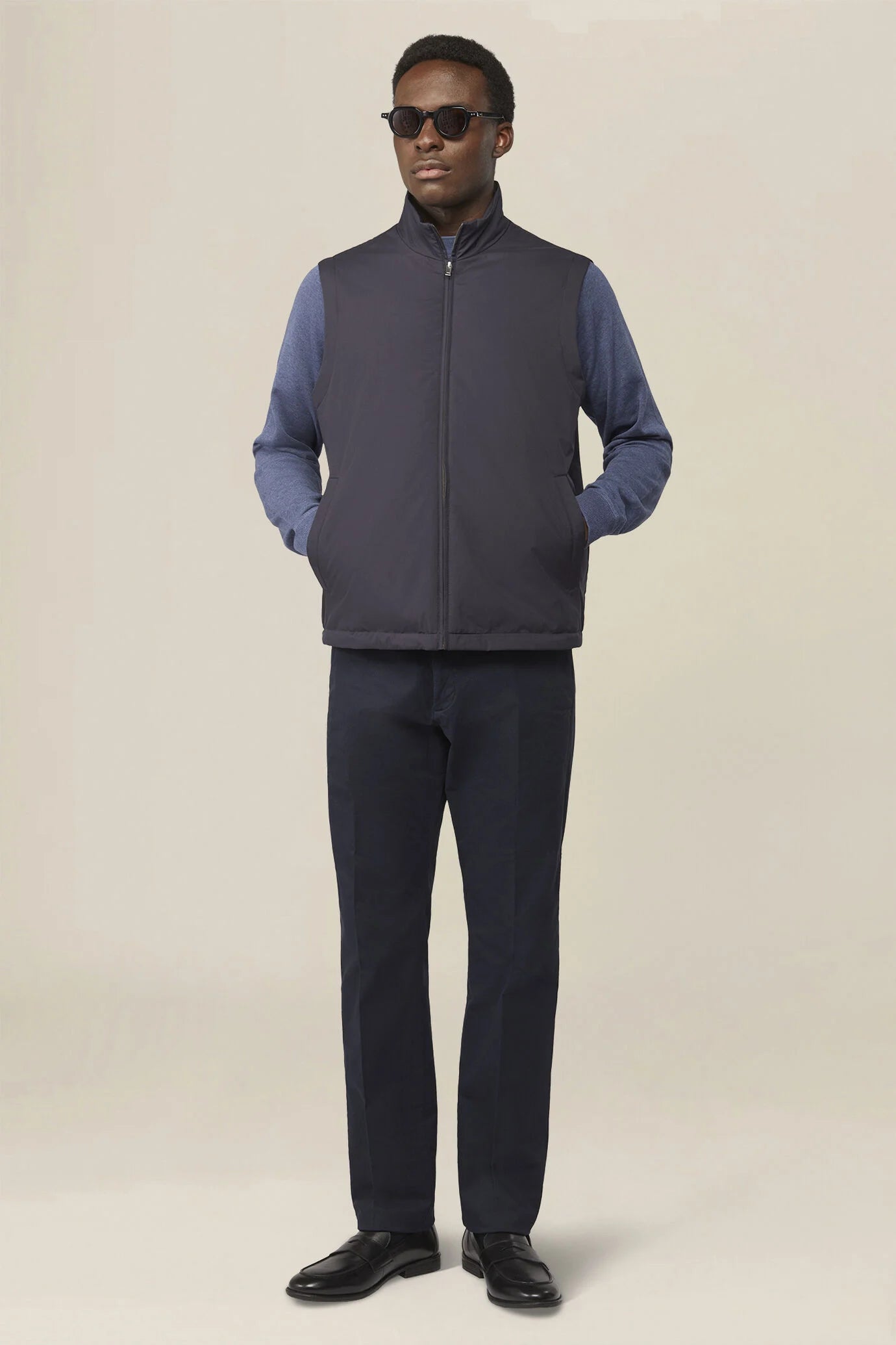 Slightly padded reversible technical fabric sleeveless jacket