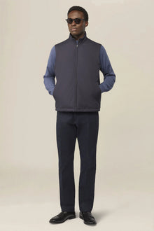 Slightly padded reversible technical fabric sleeveless jacket