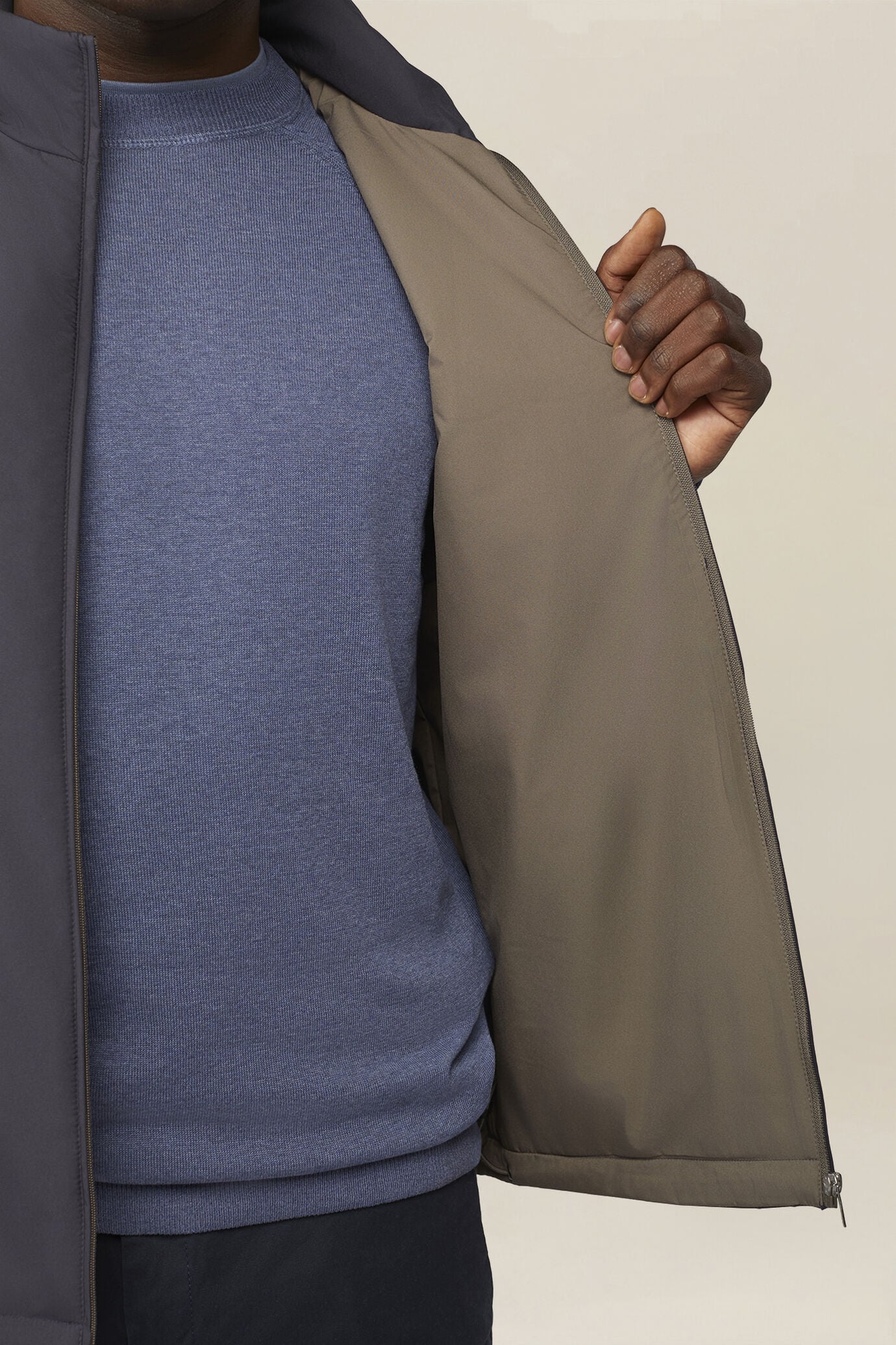 Slightly padded reversible technical fabric sleeveless jacket
