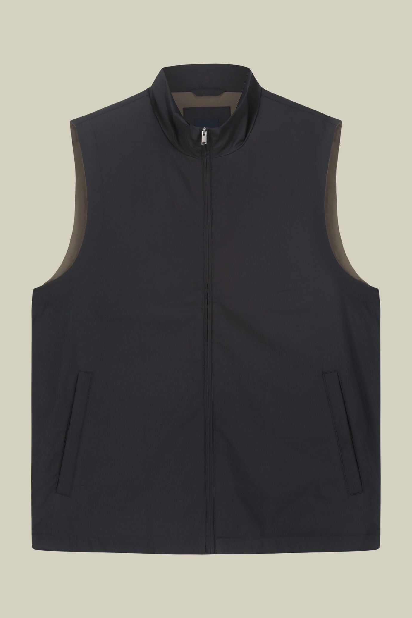 Slightly padded reversible technical fabric sleeveless jacket