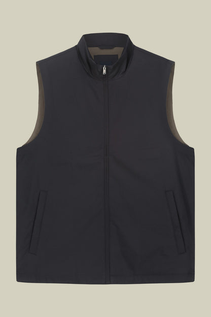 Slightly padded reversible technical fabric sleeveless jacket