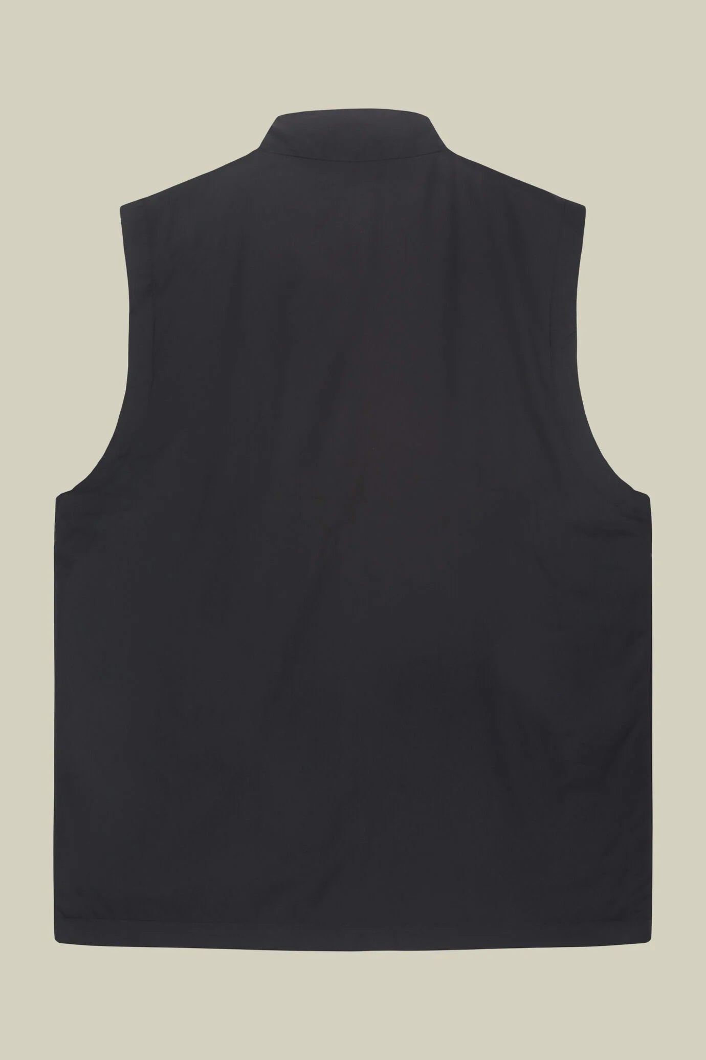 Slightly padded reversible technical fabric sleeveless jacket