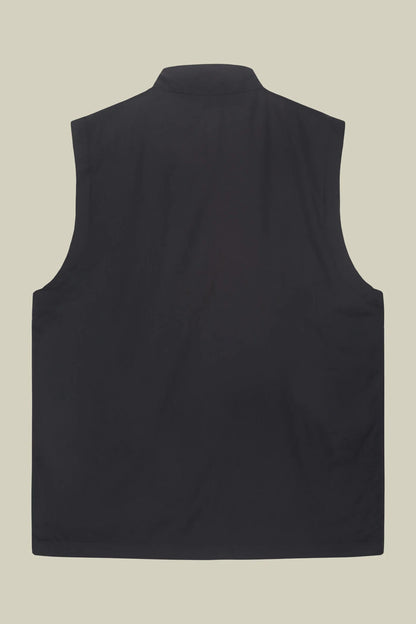 Slightly padded reversible technical fabric sleeveless jacket