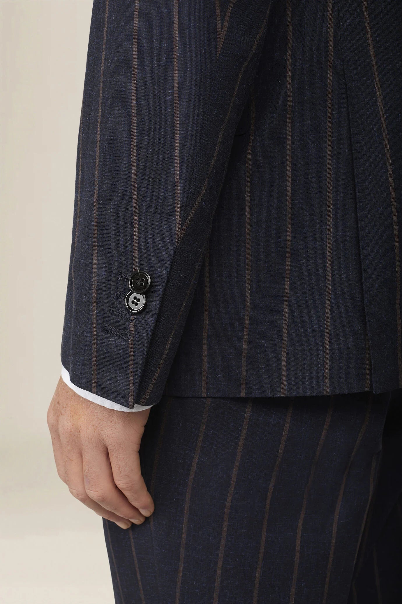 Unlined double-breasted men's jacket with pinstripe pattern