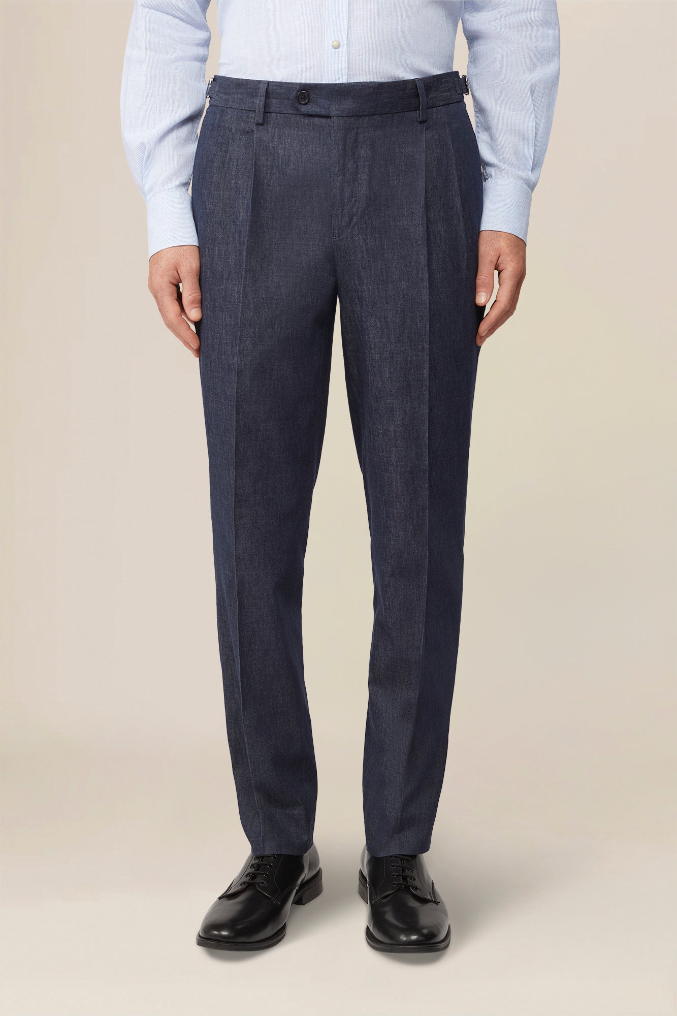 Men's trousers in chambray fabric with double pleats and side buckles